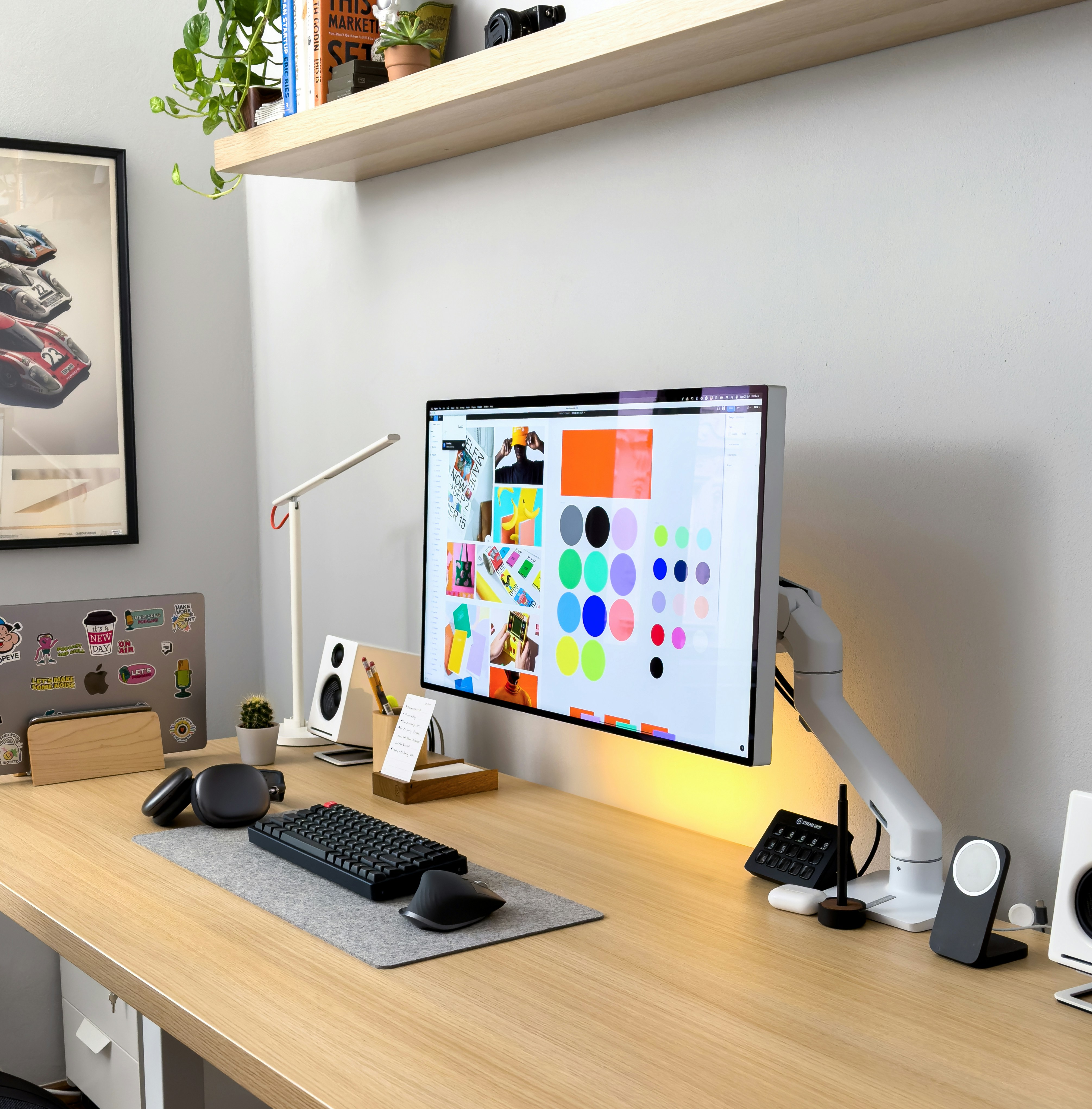 A computer monitor sitting on a wooden desk